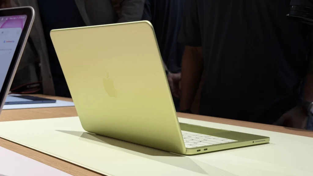 MacBook Neo citrus rear view, aluminum unibody.